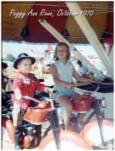 1970 riding on a carnival ride with a cousin.
